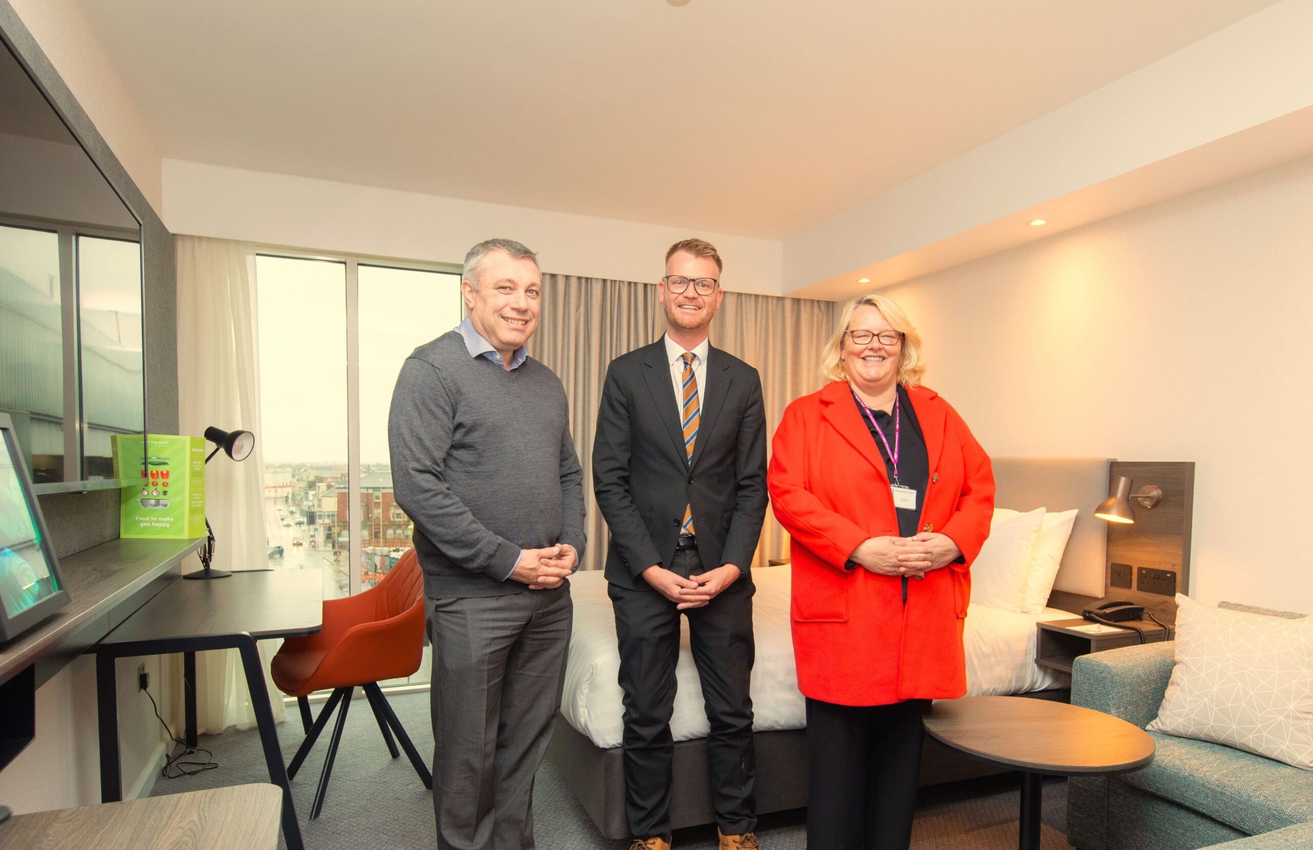 077 Cllr Mark Smith, Mark Winter and Cllr Lynn Williams in the first room at the new Holiday Inn
